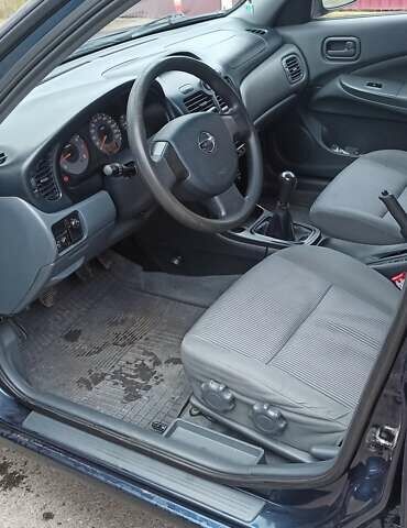 Синий Ниссан Альмера, объемом двигателя 1.6 л и пробегом 213 тыс. км за 4200 $, фото 5 на Automoto.ua