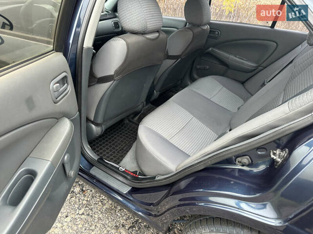 Синий Ниссан Альмера, объемом двигателя 1.6 л и пробегом 236 тыс. км за 5000 $, фото 18 на Automoto.ua