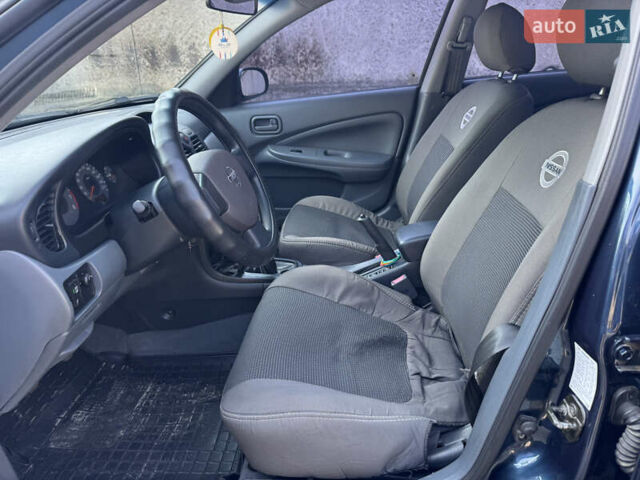 Синий Ниссан Альмера, объемом двигателя 1.6 л и пробегом 223 тыс. км за 3899 $, фото 8 на Automoto.ua