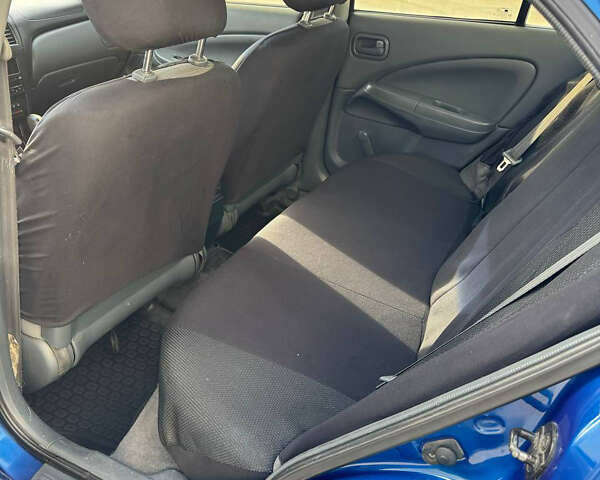 Синій Ніссан Альмера, об'ємом двигуна 1.6 л та пробігом 200 тис. км за 3899 $, фото 16 на Automoto.ua