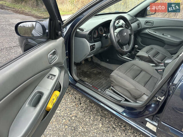 Синий Ниссан Альмера, объемом двигателя 1.6 л и пробегом 236 тыс. км за 5000 $, фото 14 на Automoto.ua