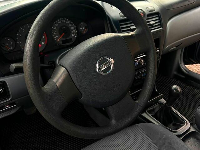 Синій Ніссан Альмера, об'ємом двигуна 1.6 л та пробігом 265 тис. км за 4150 $, фото 6 на Automoto.ua