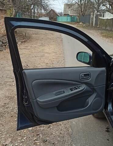 Синий Ниссан Альмера, объемом двигателя 1.6 л и пробегом 213 тыс. км за 4200 $, фото 2 на Automoto.ua