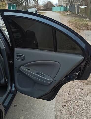 Синий Ниссан Альмера, объемом двигателя 1.6 л и пробегом 213 тыс. км за 4200 $, фото 14 на Automoto.ua