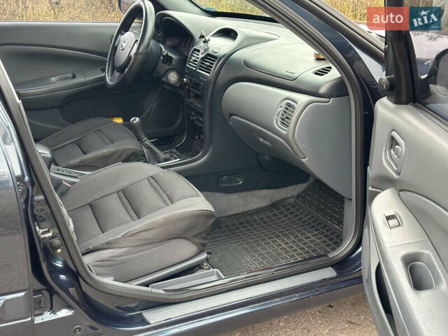Синий Ниссан Альмера, объемом двигателя 1.6 л и пробегом 236 тыс. км за 4900 $, фото 11 на Automoto.ua