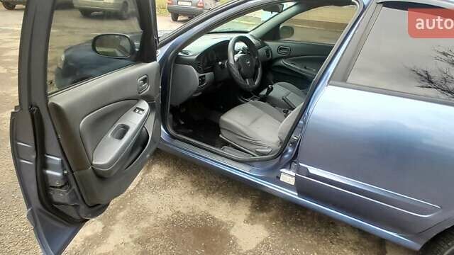 Синий Ниссан Альмера, объемом двигателя 1.6 л и пробегом 280 тыс. км за 3400 $, фото 15 на Automoto.ua