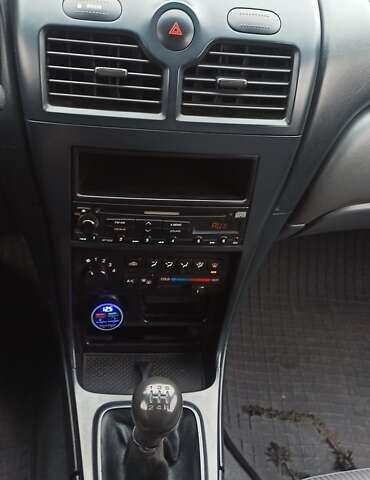 Синий Ниссан Альмера, объемом двигателя 1.6 л и пробегом 213 тыс. км за 4200 $, фото 17 на Automoto.ua