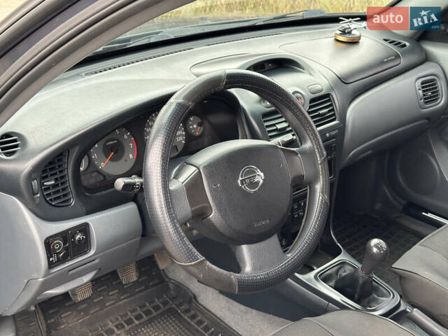 Синий Ниссан Альмера, объемом двигателя 1.6 л и пробегом 236 тыс. км за 4900 $, фото 16 на Automoto.ua