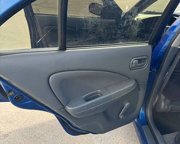 Синій Ніссан Альмера, об'ємом двигуна 1.6 л та пробігом 200 тис. км за 3899 $, фото 13 на Automoto.ua