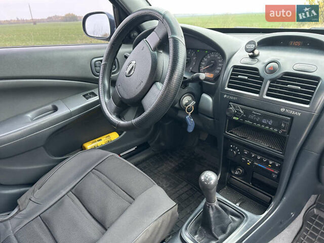 Синий Ниссан Альмера, объемом двигателя 1.6 л и пробегом 236 тыс. км за 5000 $, фото 33 на Automoto.ua