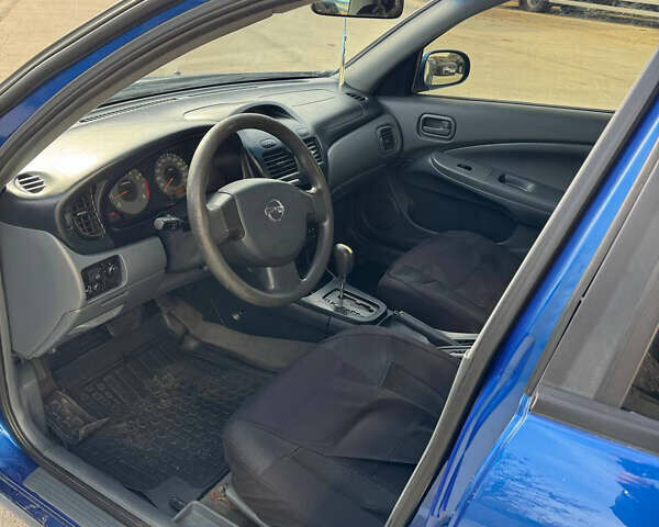 Синій Ніссан Альмера, об'ємом двигуна 1.6 л та пробігом 200 тис. км за 3899 $, фото 11 на Automoto.ua