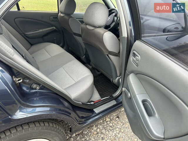 Синий Ниссан Альмера, объемом двигателя 1.6 л и пробегом 236 тыс. км за 5000 $, фото 25 на Automoto.ua