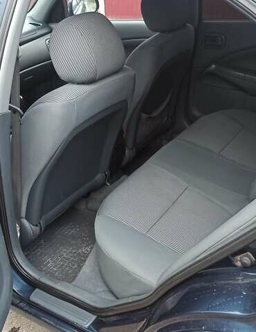 Синий Ниссан Альмера, объемом двигателя 1.6 л и пробегом 213 тыс. км за 4200 $, фото 11 на Automoto.ua