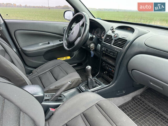 Синий Ниссан Альмера, объемом двигателя 1.6 л и пробегом 236 тыс. км за 5000 $, фото 32 на Automoto.ua