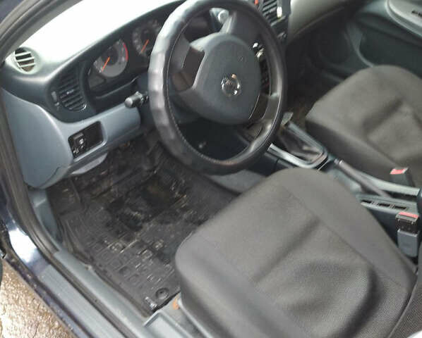 Синий Ниссан Альмера, объемом двигателя 1.6 л и пробегом 250 тыс. км за 4300 $, фото 6 на Automoto.ua