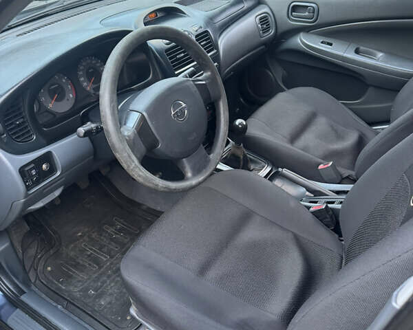 Синий Ниссан Альмера, объемом двигателя 1.6 л и пробегом 268 тыс. км за 3500 $, фото 9 на Automoto.ua