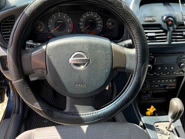 Синий Ниссан Альмера, объемом двигателя 1.6 л и пробегом 24 тыс. км за 4200 $, фото 4 на Automoto.ua