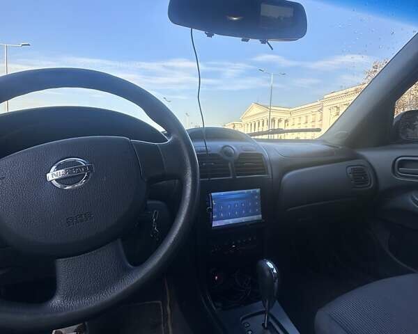 Синий Ниссан Альмера, объемом двигателя 1.6 л и пробегом 275 тыс. км за 4550 $, фото 11 на Automoto.ua