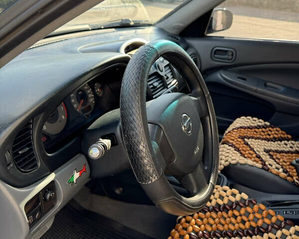 Синий Ниссан Альмера, объемом двигателя 1.6 л и пробегом 174 тыс. км за 3500 $, фото 10 на Automoto.ua