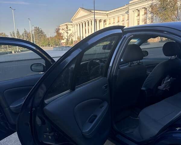 Синий Ниссан Альмера, объемом двигателя 1.6 л и пробегом 275 тыс. км за 4550 $, фото 10 на Automoto.ua