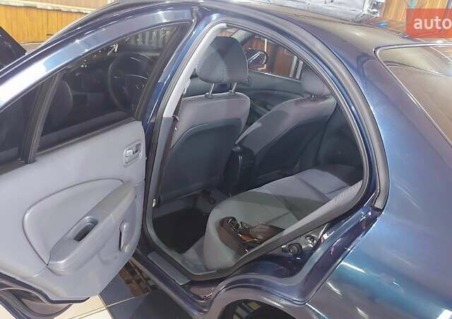 Синій Ніссан Альмера, об'ємом двигуна 1.6 л та пробігом 282 тис. км за 4200 $, фото 6 на Automoto.ua