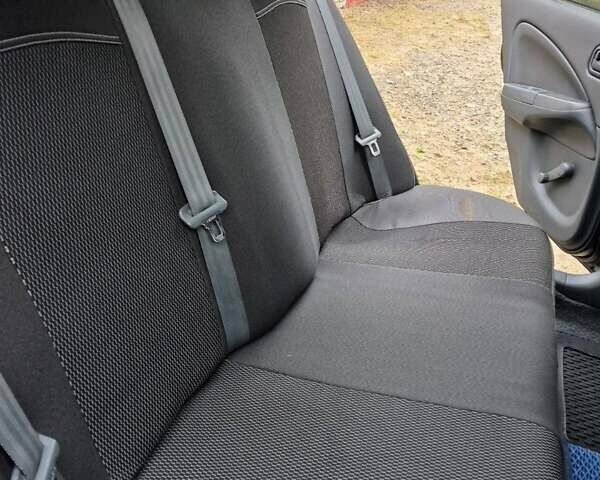 Синий Ниссан Альмера, объемом двигателя 1.6 л и пробегом 150 тыс. км за 5000 $, фото 2 на Automoto.ua