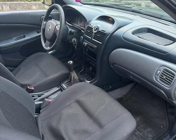 Синий Ниссан Альмера, объемом двигателя 1.6 л и пробегом 268 тыс. км за 3500 $, фото 7 на Automoto.ua