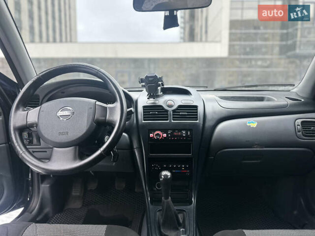 Синий Ниссан Альмера, объемом двигателя 1.6 л и пробегом 270 тыс. км за 4099 $, фото 6 на Automoto.ua