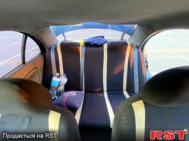 Синий Ниссан Альмера, объемом двигателя 1.6 л и пробегом 280 тыс. км за 4300 $, фото 5 на Automoto.ua