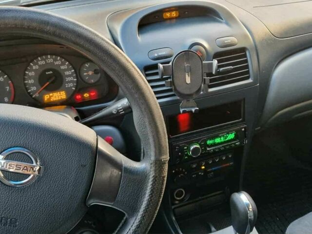 Синій Ніссан Альмера, об'ємом двигуна 1.6 л та пробігом 250 тис. км за 5100 $, фото 7 на Automoto.ua