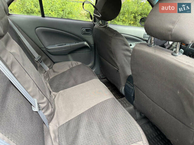 Синий Ниссан Альмера, объемом двигателя 1.6 л и пробегом 182 тыс. км за 4290 $, фото 17 на Automoto.ua