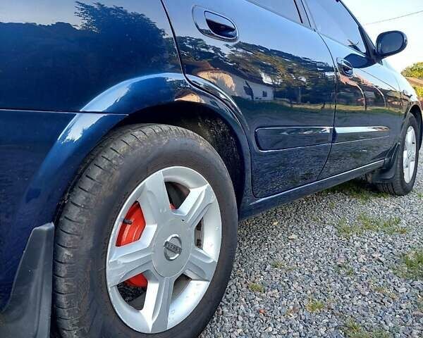 Синий Ниссан Альмера, объемом двигателя 1.6 л и пробегом 257 тыс. км за 3800 $, фото 3 на Automoto.ua