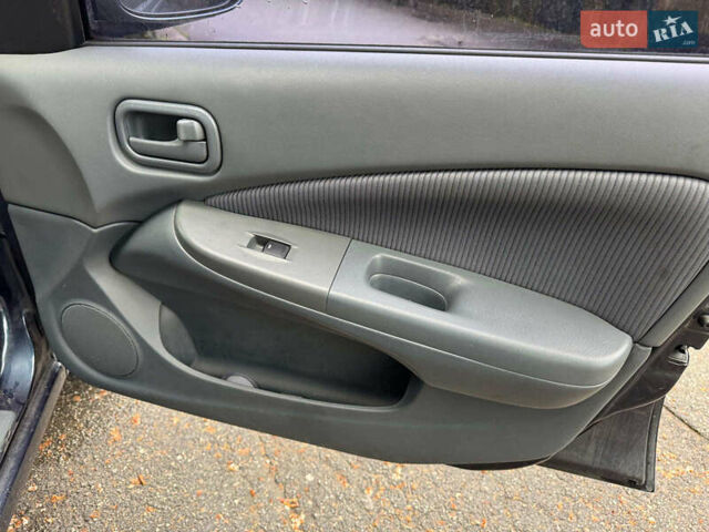 Синий Ниссан Альмера, объемом двигателя 1.6 л и пробегом 182 тыс. км за 4290 $, фото 19 на Automoto.ua