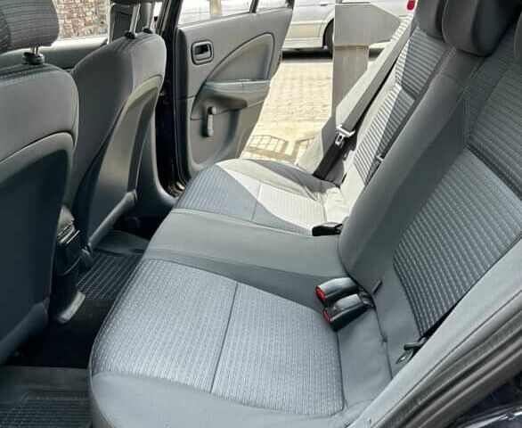 Синий Ниссан Альмера, объемом двигателя 1.6 л и пробегом 315 тыс. км за 3300 $, фото 6 на Automoto.ua