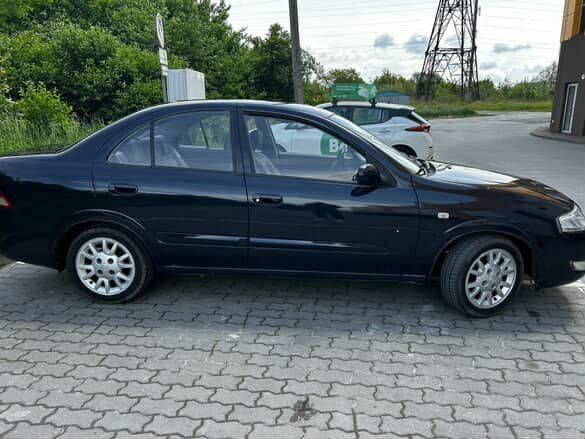 Синий Ниссан Альмера, объемом двигателя 1.6 л и пробегом 315 тыс. км за 3300 $, фото 1 на Automoto.ua