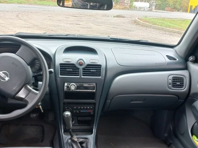 Синій Ніссан Альмера, об'ємом двигуна 1.6 л та пробігом 342 тис. км за 3250 $, фото 5 на Automoto.ua