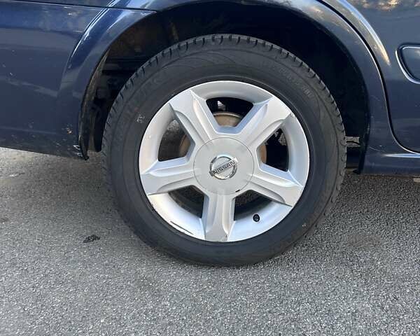Синий Ниссан Альмера, объемом двигателя 1.6 л и пробегом 275 тыс. км за 4550 $, фото 5 на Automoto.ua