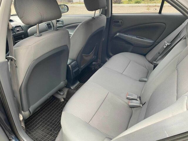 Синий Ниссан Альмера, объемом двигателя 1.6 л и пробегом 98 тыс. км за 5850 $, фото 12 на Automoto.ua