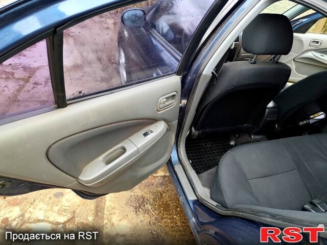 Синий Ниссан Альмера, объемом двигателя 1.6 л и пробегом 191 тыс. км за 4800 $, фото 7 на Automoto.ua