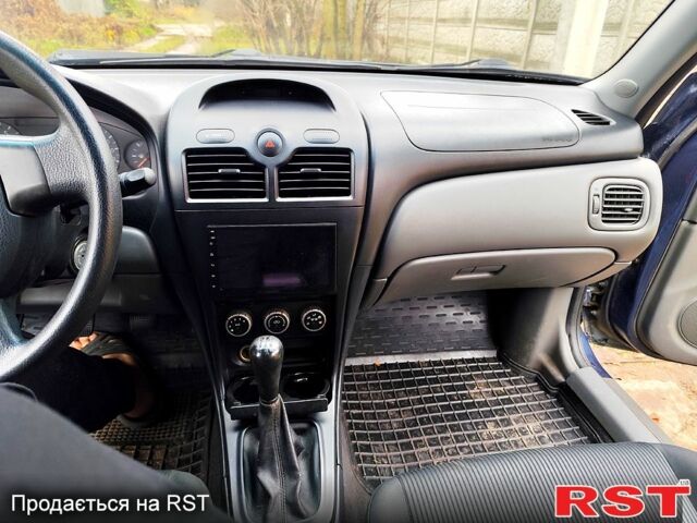 Синий Ниссан Альмера, объемом двигателя 1.6 л и пробегом 191 тыс. км за 4800 $, фото 11 на Automoto.ua