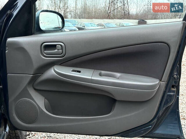 Синій Ніссан Альмера, об'ємом двигуна 1.6 л та пробігом 191 тис. км за 4100 $, фото 20 на Automoto.ua