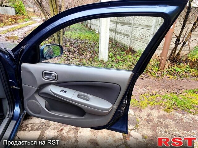 Синий Ниссан Альмера, объемом двигателя 1.6 л и пробегом 191 тыс. км за 4800 $, фото 5 на Automoto.ua