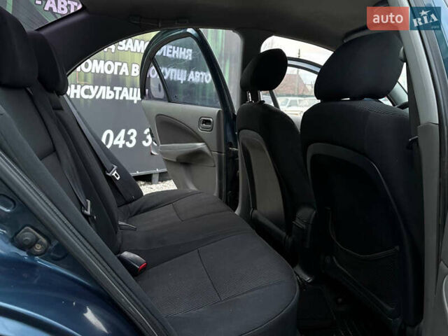 Синій Ніссан Альмера, об'ємом двигуна 1.6 л та пробігом 191 тис. км за 4100 $, фото 16 на Automoto.ua