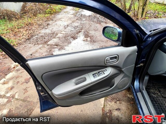 Синий Ниссан Альмера, объемом двигателя 1.6 л и пробегом 191 тыс. км за 4800 $, фото 4 на Automoto.ua