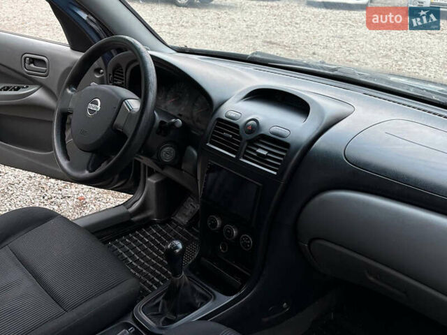 Синій Ніссан Альмера, об'ємом двигуна 1.6 л та пробігом 191 тис. км за 4100 $, фото 19 на Automoto.ua