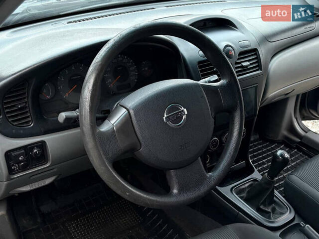 Синій Ніссан Альмера, об'ємом двигуна 1.6 л та пробігом 191 тис. км за 4100 $, фото 9 на Automoto.ua