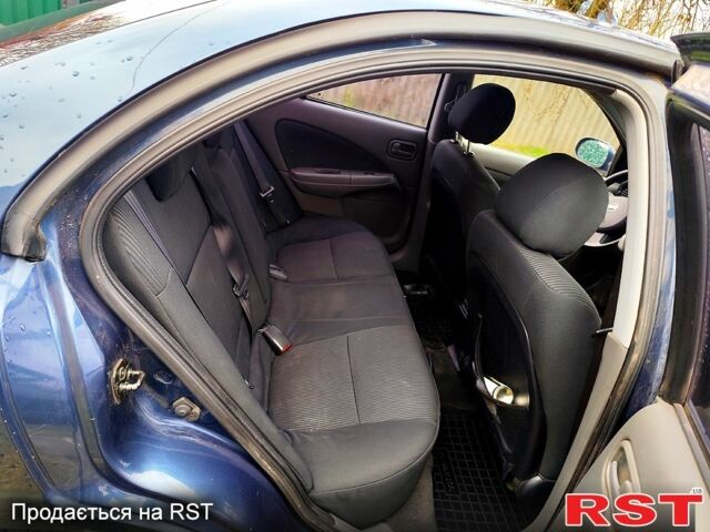 Синий Ниссан Альмера, объемом двигателя 1.6 л и пробегом 191 тыс. км за 4800 $, фото 8 на Automoto.ua