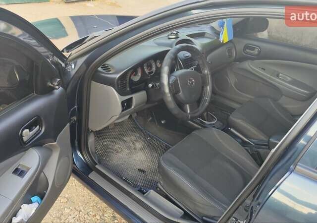 Синий Ниссан Альмера, объемом двигателя 1.6 л и пробегом 125 тыс. км за 5200 $, фото 3 на Automoto.ua
