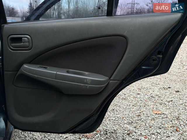 Синій Ніссан Альмера, об'ємом двигуна 1.6 л та пробігом 191 тис. км за 4100 $, фото 17 на Automoto.ua