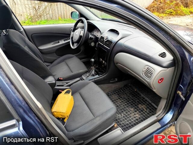 Синий Ниссан Альмера, объемом двигателя 1.6 л и пробегом 191 тыс. км за 4800 $, фото 9 на Automoto.ua